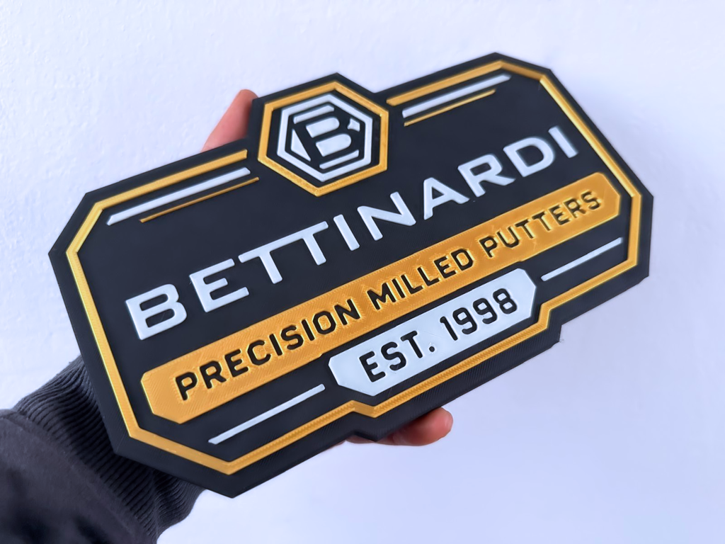 Bettinardi Putters Inspired Golf Wall Plaque, Black Gold & White, 22cm