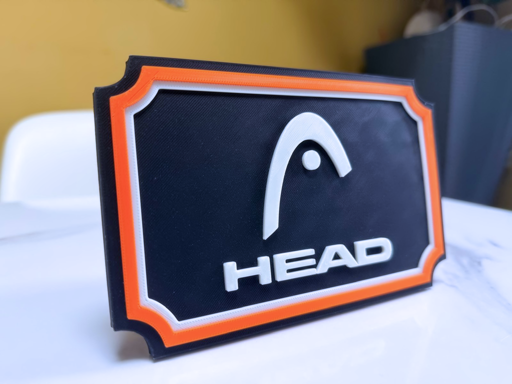 HEAD Inspired Tennis Wall Plaque, Black White & Orange, 17cm