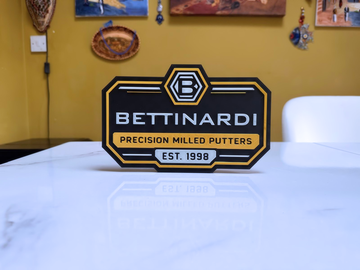Bettinardi Putters Inspired Golf Wall Plaque, Black Gold & White, 22cm